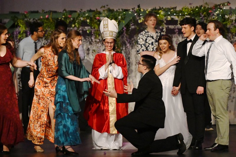 Sam Carmichael, played by Daniel Cunningham, proposes to Donna, played by Daphne Mock, after her daughter calls off her wedding.