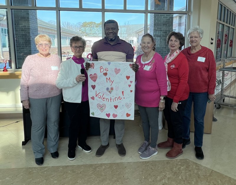 Displaying the Valentine’s Day card from Cape Henlopen Elks Lodge 2540 are (l-r) Elks member Pat Barnes, Community Outreach Chair Barb Gilsenan, and Stockley Center representatives Bert Fonyuy, Nancy Bush, Kathy Fox and Janet Wolf. SUBMITTED PHOTO