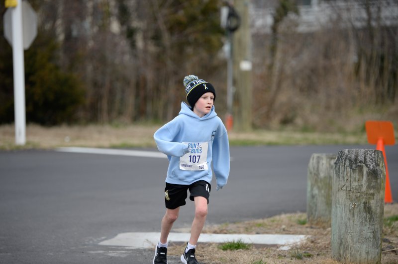 Hudson Barefoot, 9, logs a time of 25:14.