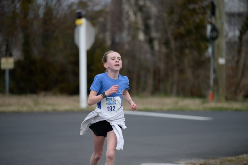 Annie Kilcur, 12, completes the course in 27:18.