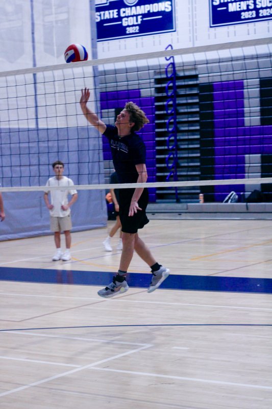 Sussex Academy junior Desmond Davis focuses on his hit.