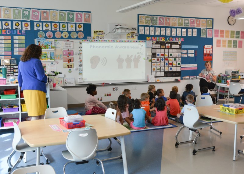 Delaware Department of Education Secretary Cindy Marten observes Rehoboth Elementary teacher Kristen Greenly’s kindergarten lesson about phonemic awareness and reading.