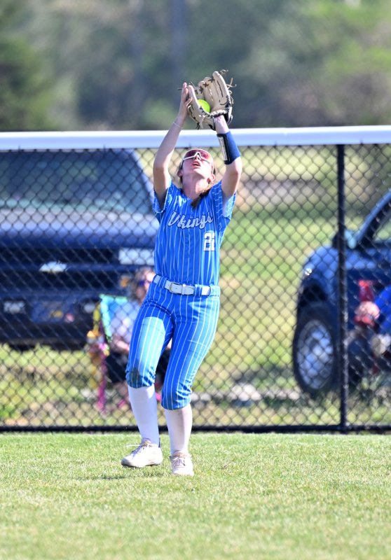 Sophomore Lyla Hunsberger squeezes a fly ball in center.