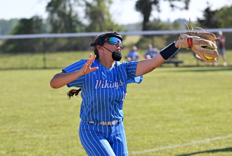 Sophomore seconds baseman Mia Scott snags a Central popup in foul territory.