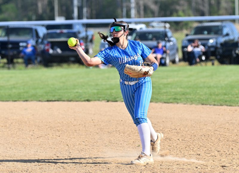 Cape sophomore Mia Scott throws to first for an out.