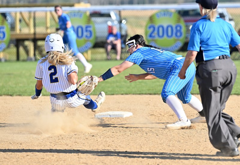 Cape freshman Makaila Sellers gets an out on Central’s Avery Savage at second.
