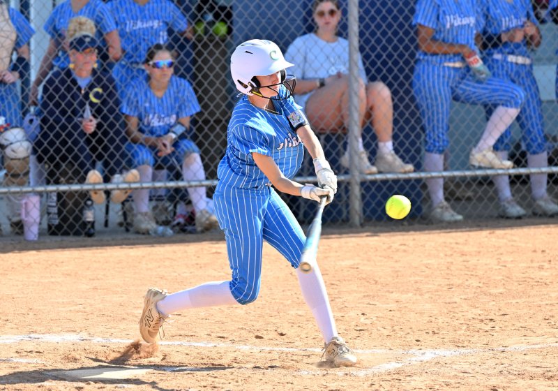 Freshman Emma Reynolds slams a ball for the Vikings.