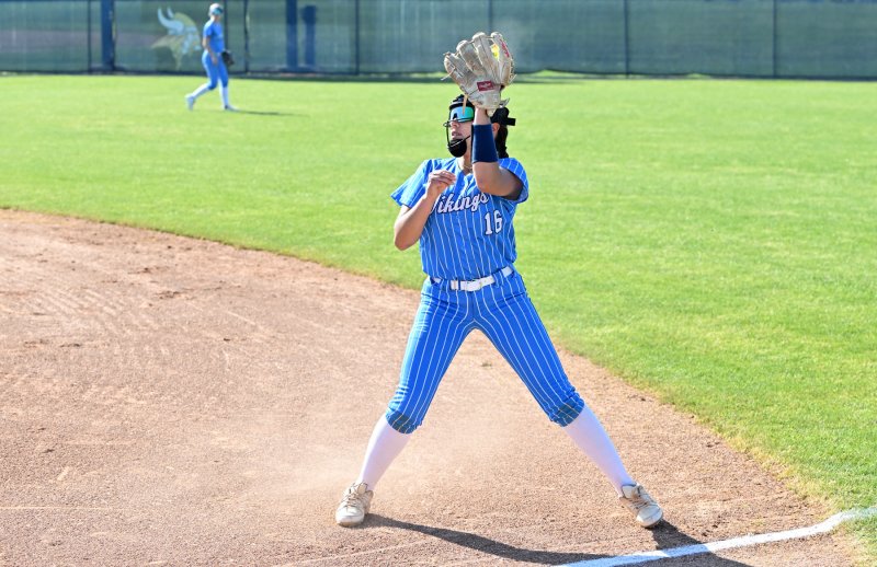 Vikings sophomore Mia Scott grabs a pop up for an out.