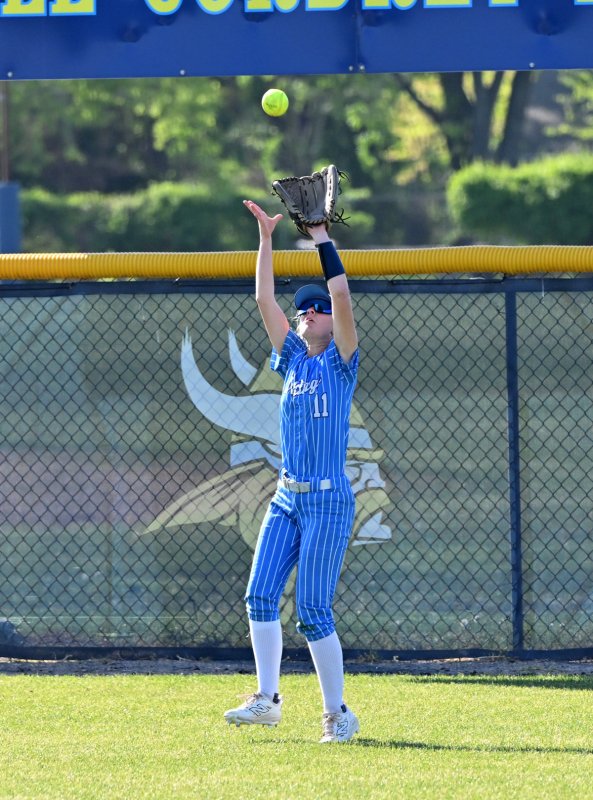 Senior Alivia Longo pulls in an fly ball for an out.