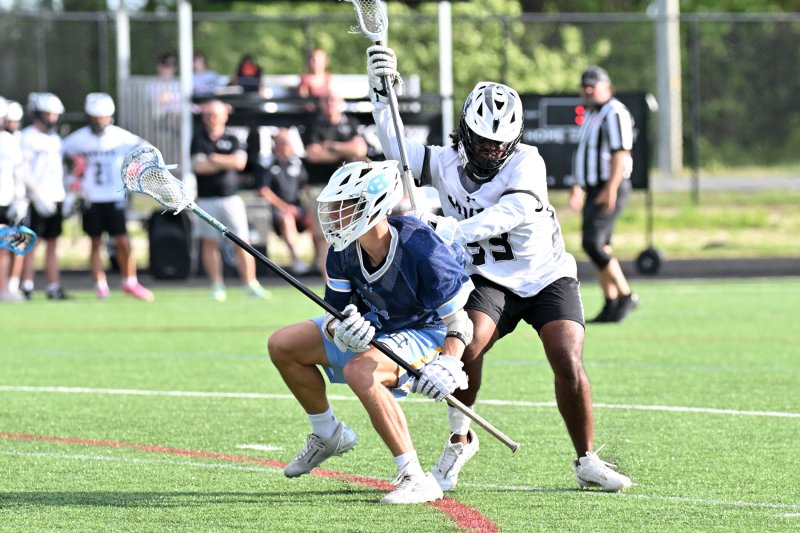 Cape defender Mason Jack goes under the check by a Tech middie.