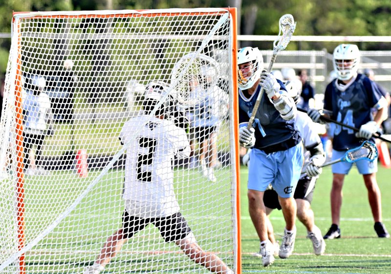 Cape’s Braddock Smith puts a left-handed shot in the upper net for one of his two goals in the game.