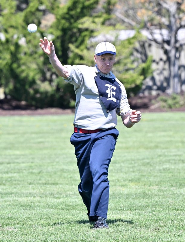 George "Pic" Algard gets the ball in quickly for the Elkton squad.