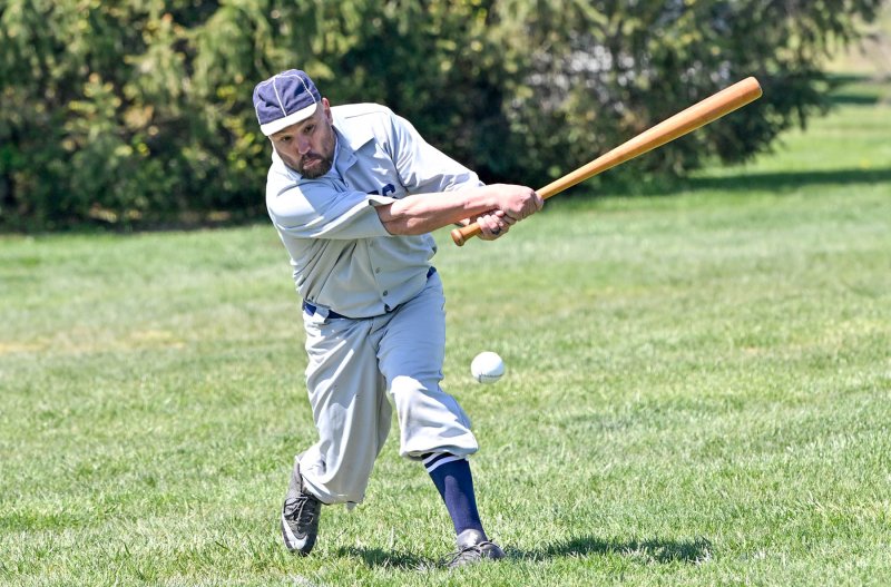 Lewes batter Pat “Bullfrog” Zmuda slams a hit in the loss to Elkton.