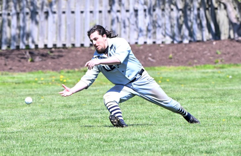 Lewes Base Ball Club’s Chris “Lovey” Chapdelaine goes for an out in left field April 12. DAN COOK PHOTOS