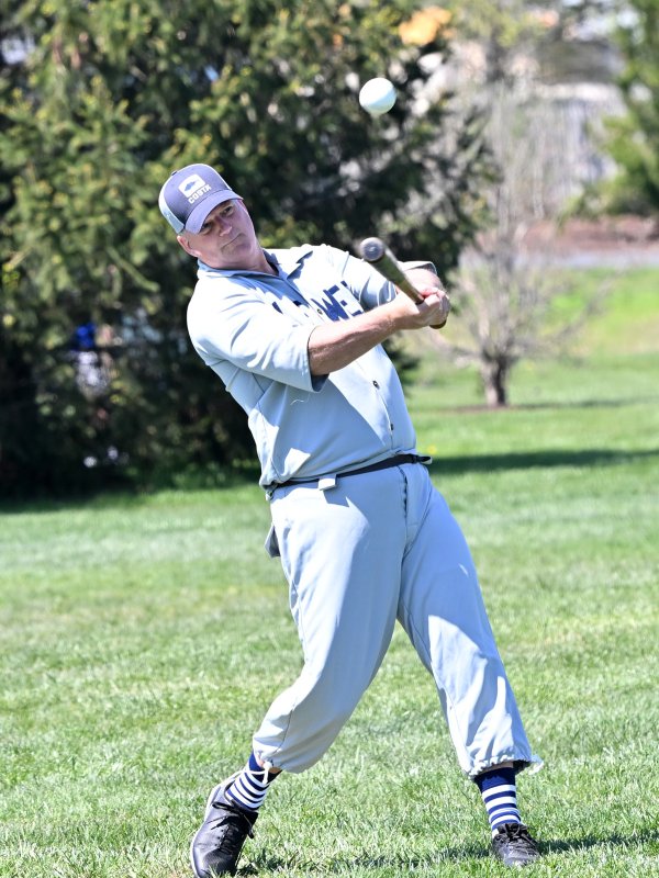 Bill Ramsey drives a hit for Lewes.