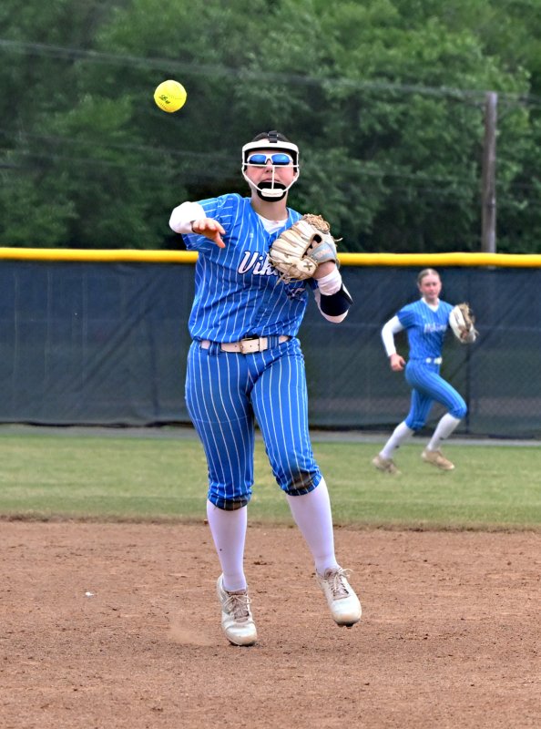 Cape freshman Makaila Sellers throws to first for an out.