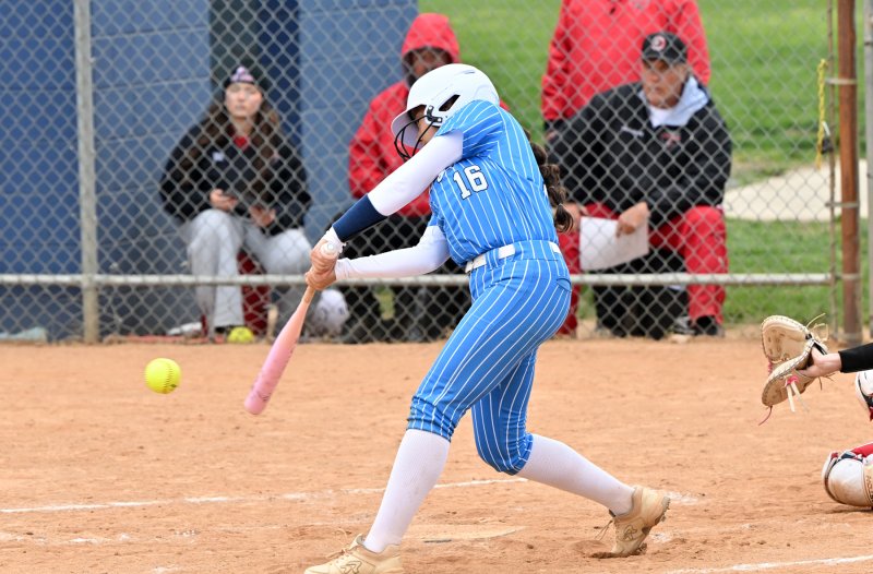 Vikings sophomore Mia Scott gets a hit.