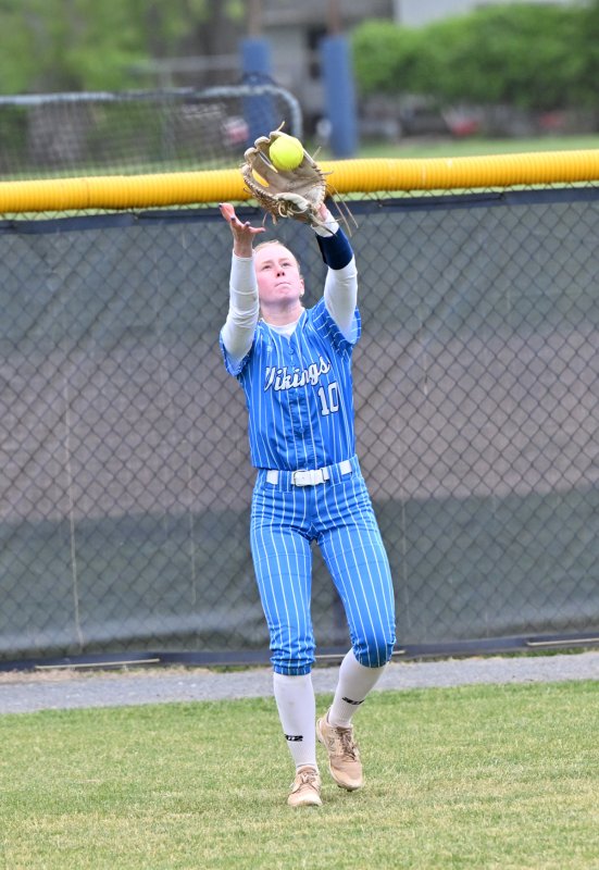 Olivia Mekulski snags a fly ball for Cape.