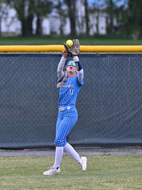 Ca[pe senior Alivia Longo snags a fly ball for an out in the seventh inning.