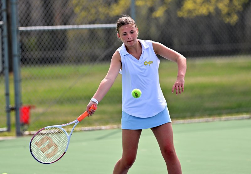 Mia Thompson hits a forehand drive at second doubles.