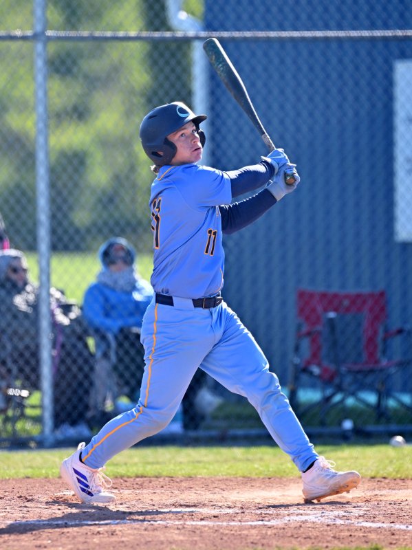 Junior Aaden Johnson slams a double for the Vikings.