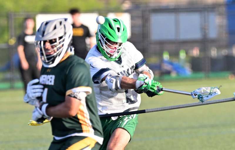 Del Tech sophomore Landon Hudson (Milford) shoots and scores.