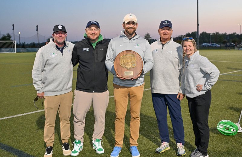 The Delaware Tech lax coaches stand proudly with the Region 19 championship. Shown are (l-r) assistants Kyle Griffith and Franc Cook, head coach Dan Yearick and assistant Bill Gorrow and athletic trainer Morgan Brown.