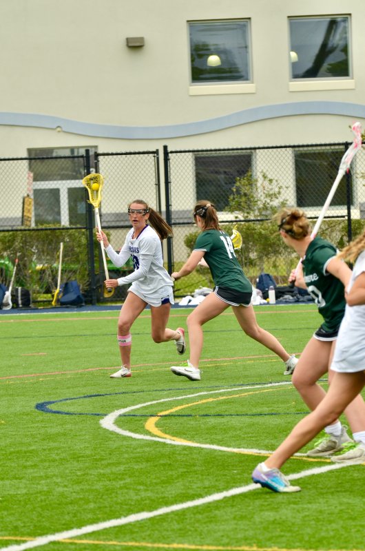 Sussex Academy senior Shea Danahy looks inside during her dodge.