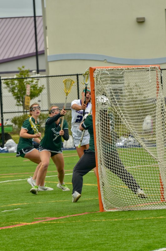 Sussex Academy junior Liz Layton tucks this ball into the net.