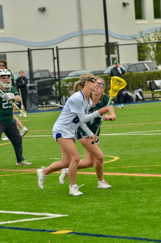 Sussex Academy junior Savannah Couch operates near goal line extended.