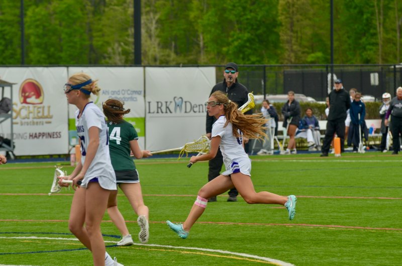 Sussex Academy senior Ellie Merrick tries to beat her defender during the Seahawks’ 11-6 loss to Archmere April 25. AARON R. MUSHRUSH PHOTOS