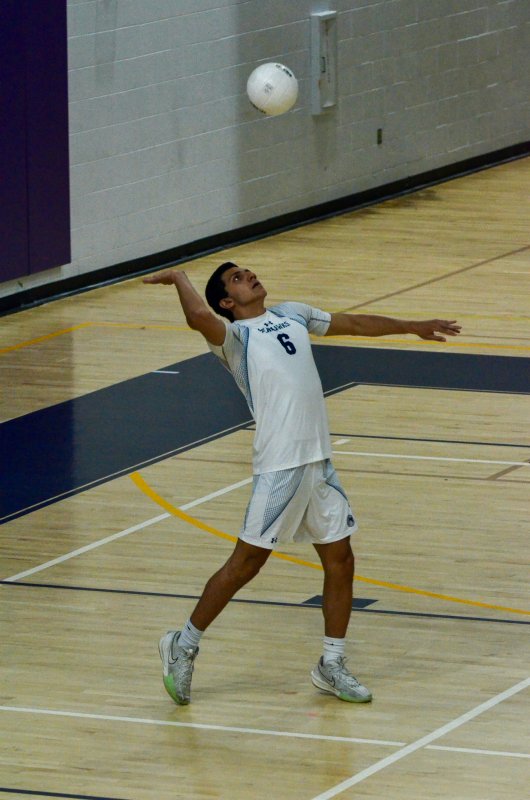 Seahawks senior Christian Wright begins to swing on his serve.