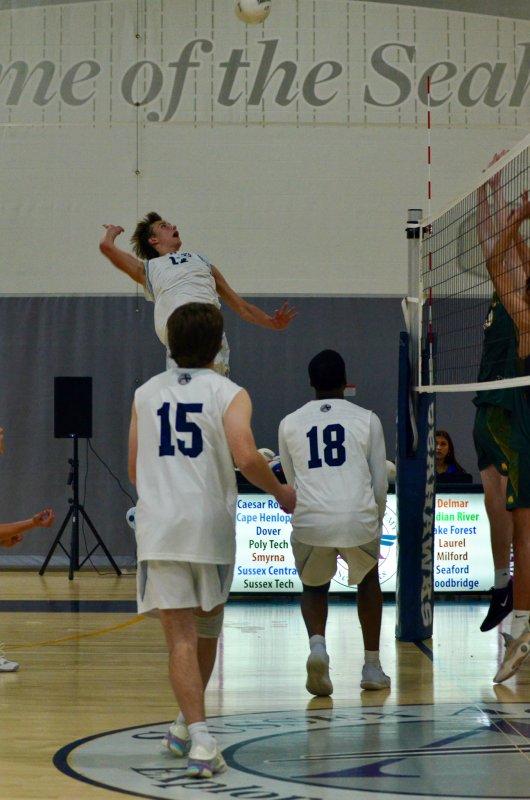 Sussex Academy junior Mack Lawson soars above the Saint Mark’s block.