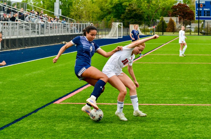 Seahawks junior Maya Hastings battles for the ball down the right flank during Sussex Academy’s 1-0 win over Polytech April 28. AARON R. MUSHRUSH PHOTOS