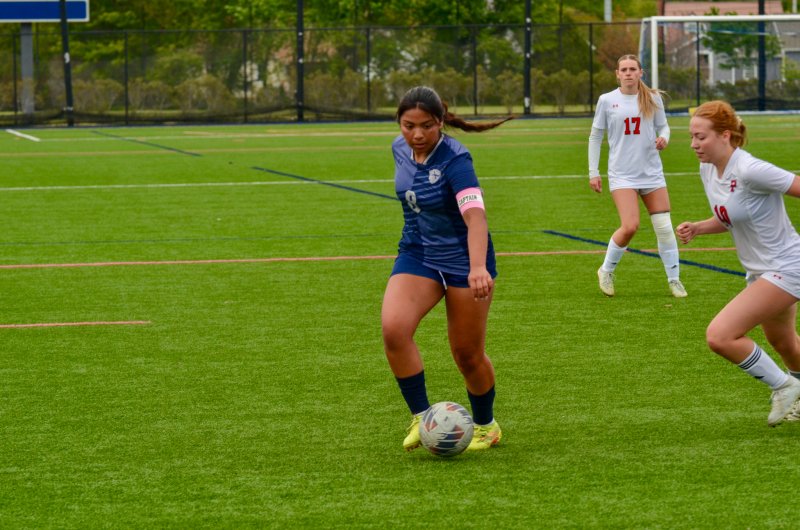 Sussex Academy senior Yuvia Velasquez-Juarez controls the ball.