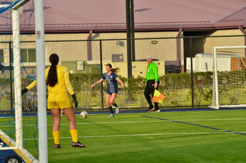 Sussex Academy freshman Jordan Blades crosses the ball.