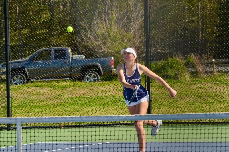 Sussex Academy sophomore Ryan Shipp sends the ball back on its return trip in second doubles.