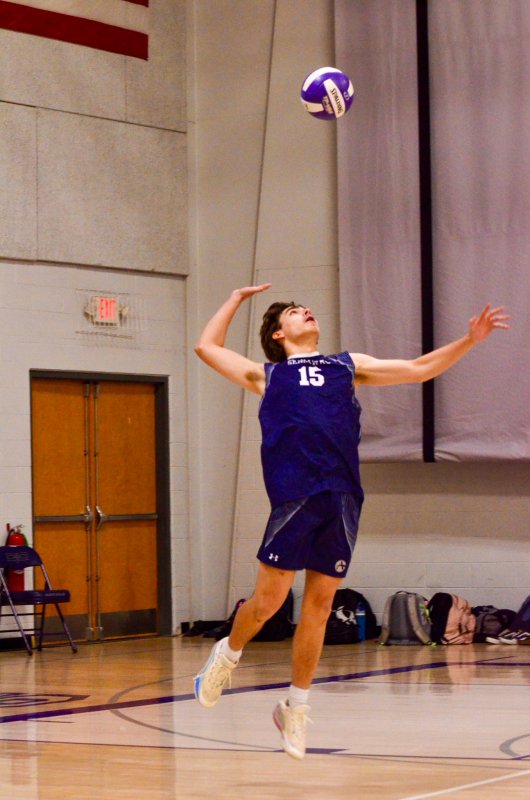 Seahawks senior Vito Barone hops up on a serve.