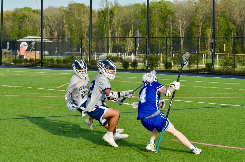 Sussex Academy junior Brandon Jaimes sticks close on defense.