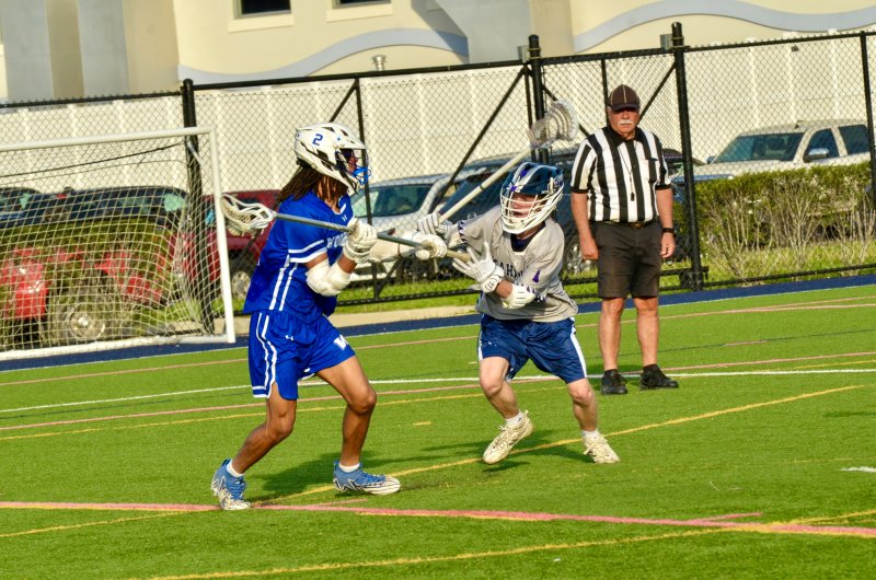 Sussex Academy junior Anthony Tattoli throws a check on a ride.