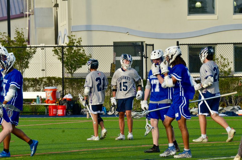 Sussex Academy sophomore Cooper Hagy, center, tallied nine points in the 17-2 win over Woodbridge April 15, while Gideon Sammons, left, netted a hat trick and Ty Jarrell, right, led all scorers with five goals. AARON R. MUSHRUSH PHOTOS