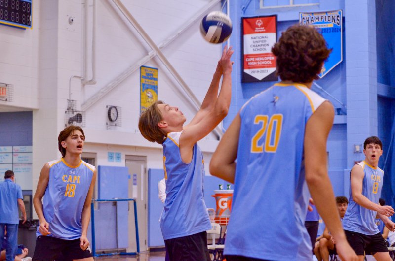 Vikings junior Anton Schierenberg receives a serve.
