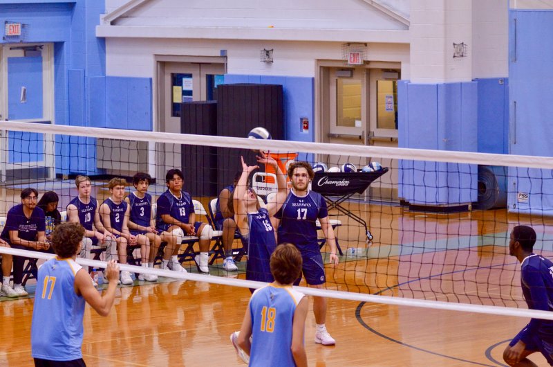 Sussex Academy senior Vito Barone sets the ball.