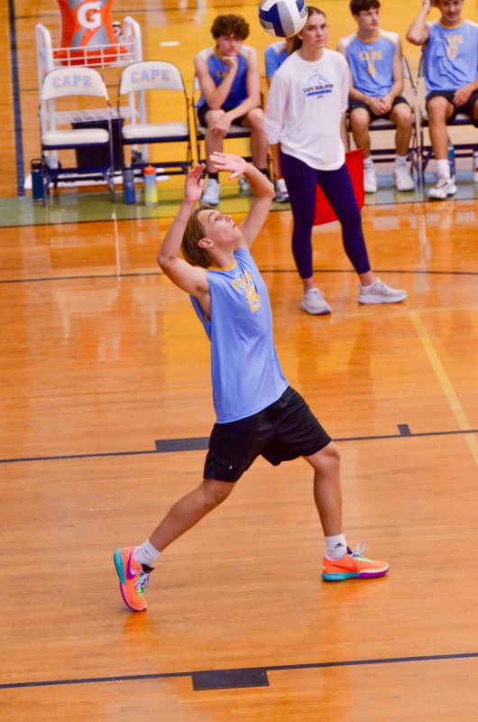 Vikings junior Anton Schierenberg focuses on his serve.