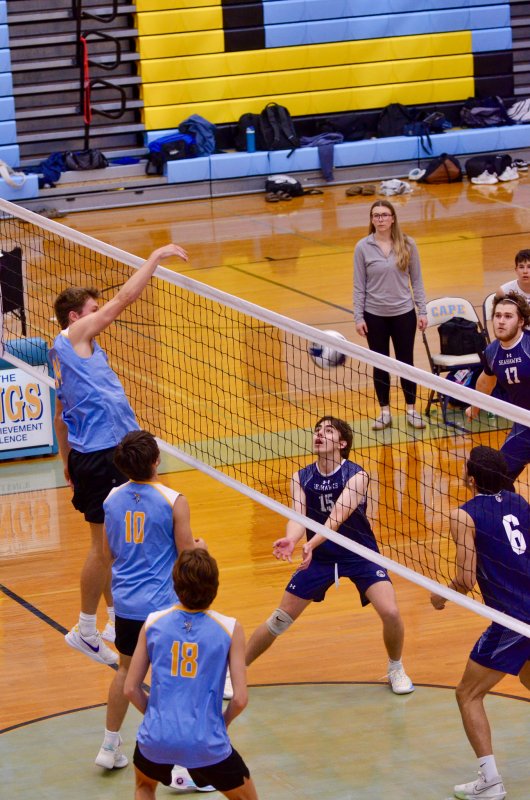 Cape senior Lawson Whaley dunks the ball at center court.