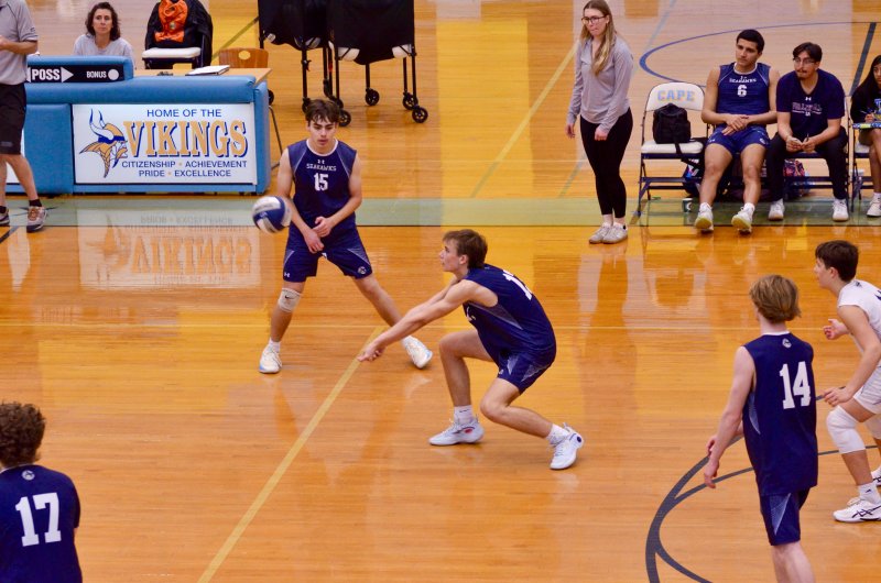 Sussex Academy junior Mack Lawson receives a serve.