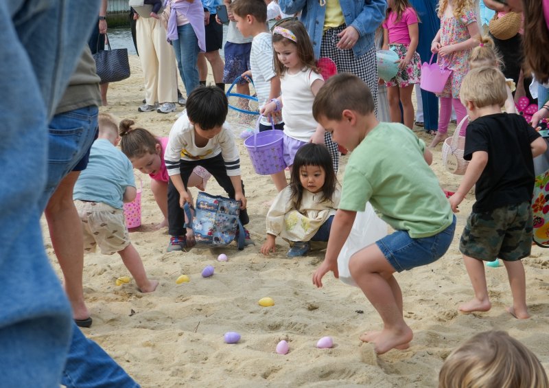 At the Dewey Business Partnership’s annual Easter Egg Scoop April 4, children in the 2-4-year-old age group collect Easter eggs on the bay beach near the Lighthouse.