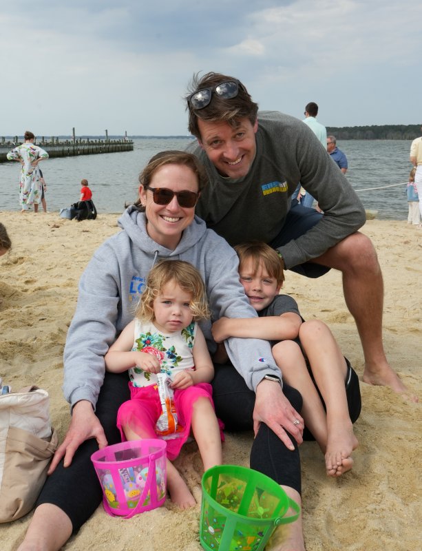The Spence family has their Easter egg buckets ready. Shown are parents Jessica and Steve, and children Emma and Elliot.