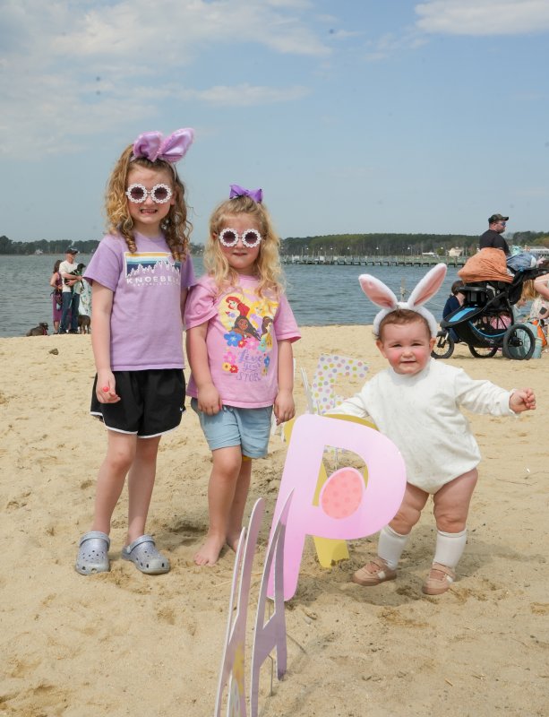 The Martinson sisters sport bunny ears and matching sunglasses April 4 at the Dewey Egg Scoop. Shown are (l-r) Natalie, Sophia and Colette.