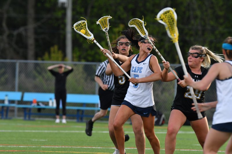 Claire Lopez looks for shooting space then rings the bell. DAVE FREDERICK PHOTOS